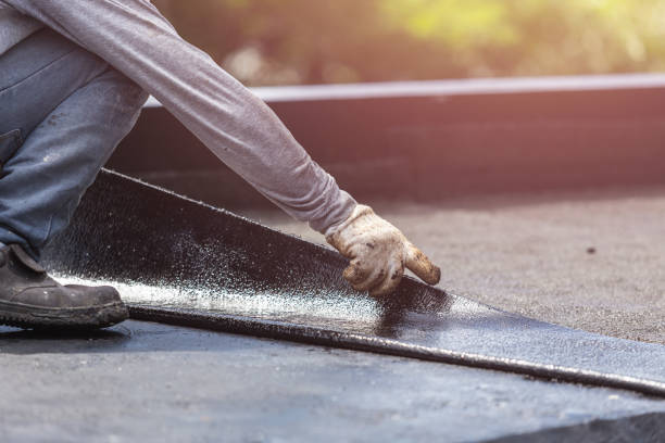 Professional Waterproofing technician working in Bloomington, IN